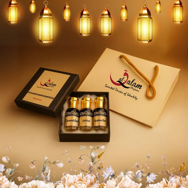 Set of scented products with 'Al Qalam' branding on a decorative background with hanging lights.