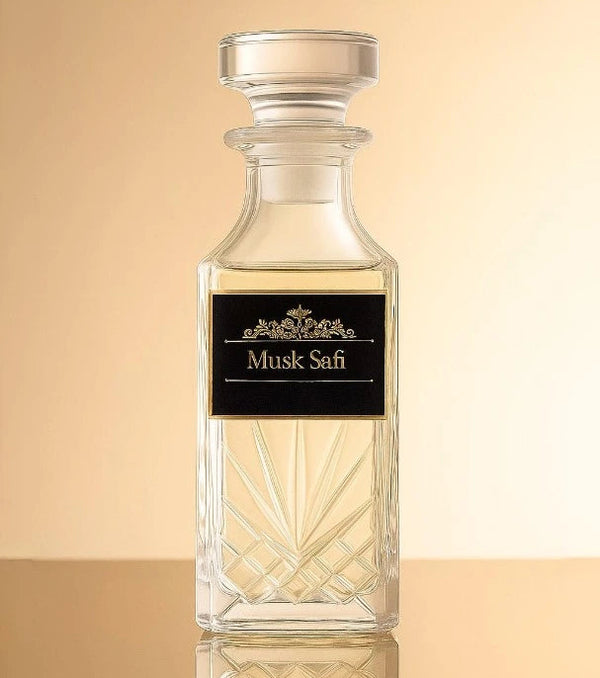 Glass perfume bottle with a black label on a beige background